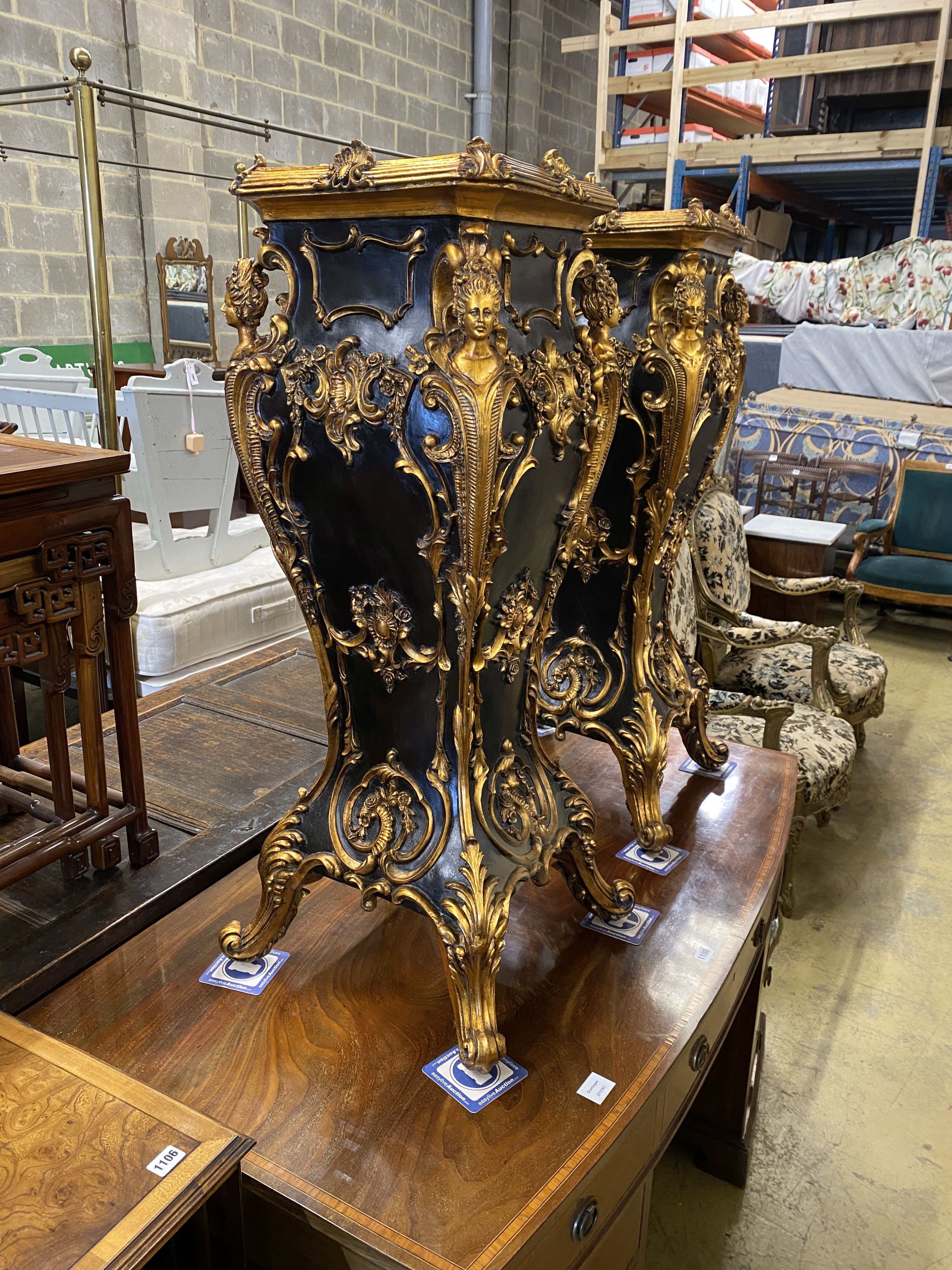 A pair of painted metal 18th century style pedestals, width 35cm, height 104cm